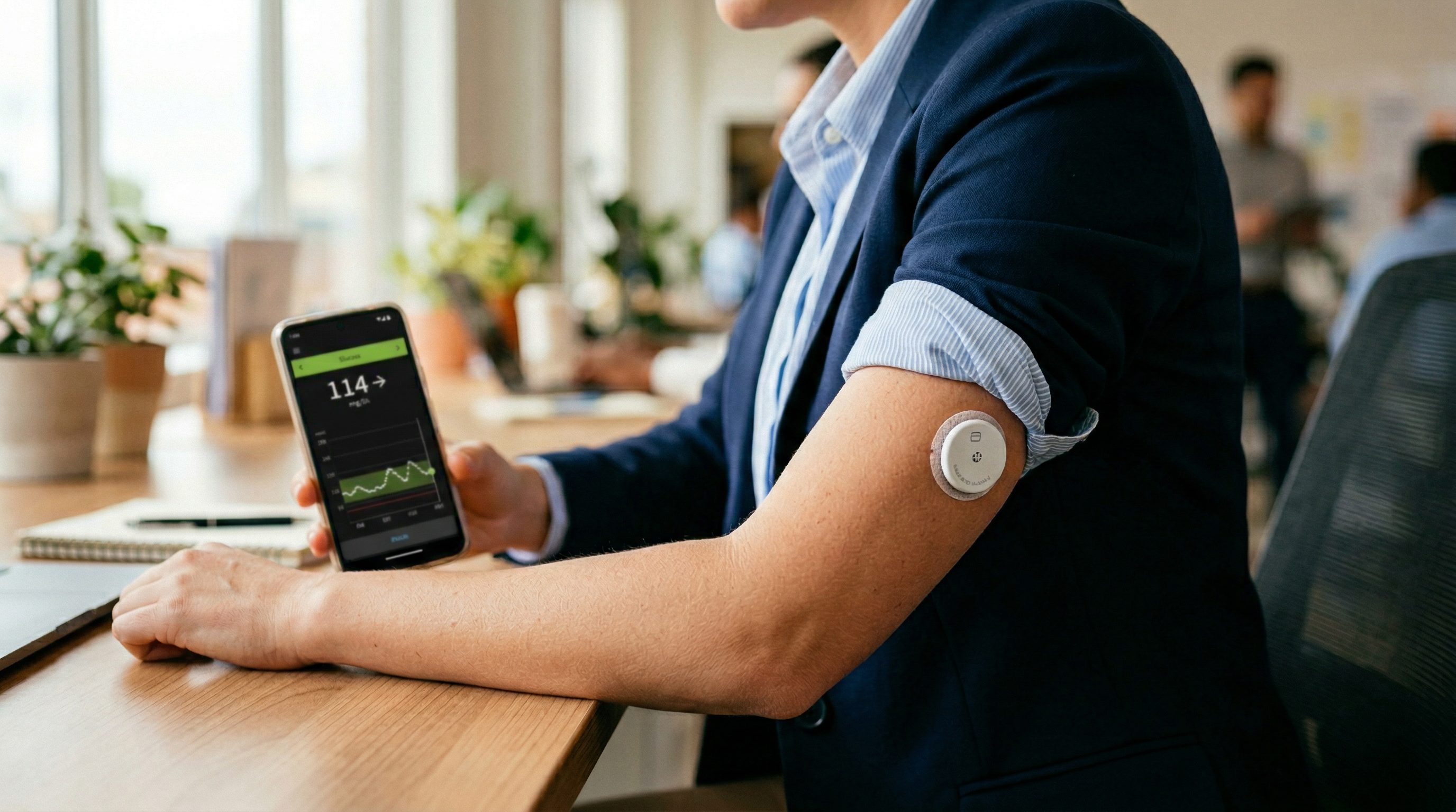 Professional wearing a continuous glucose monitor CGM sensor with smartphone glucose tracking app