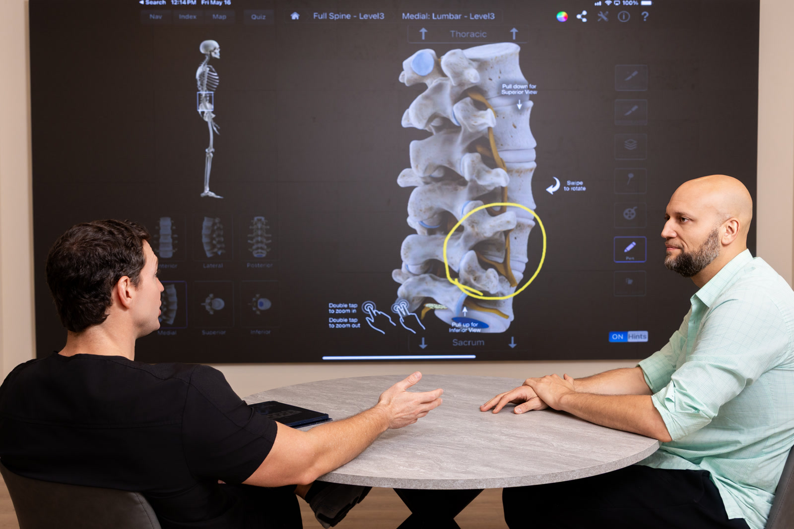 Dr. Turner explaining anatomy during a CartiNova consultation