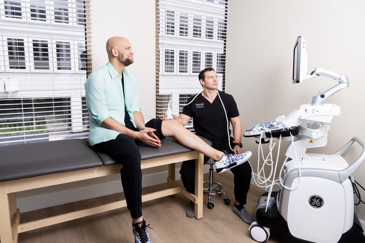 Pravida Health staff providing personalized longevity consultation